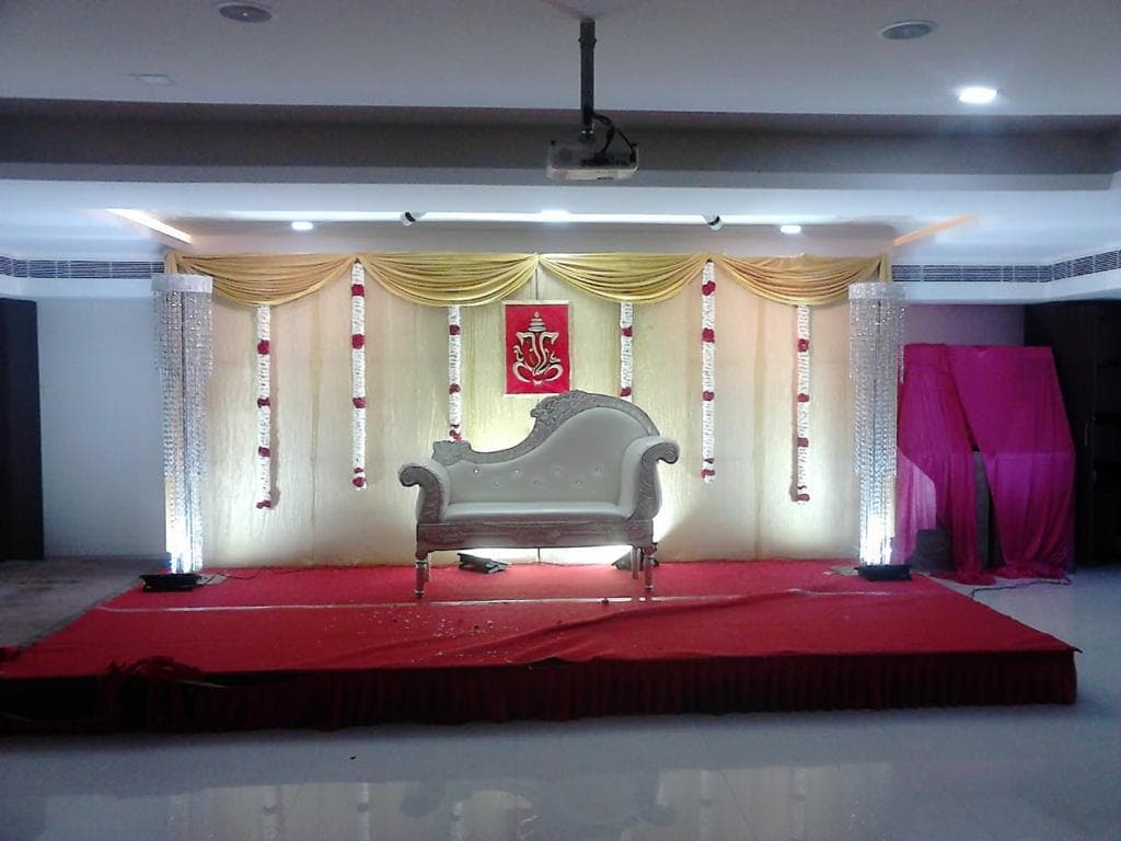 Royal Golden Drape Mandap with Ganesha Centerpiece